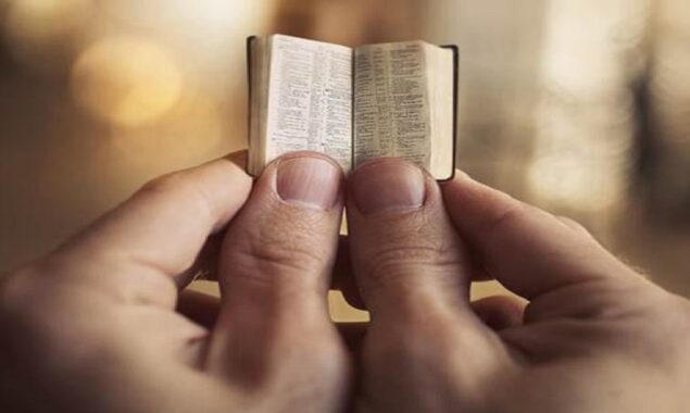 Tiny Bible replica size of a coin, from 16th century, rediscovered at Leeds Library