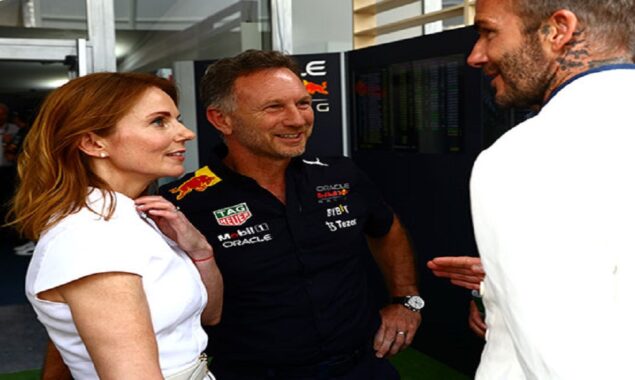 David Beckham beams at Geri Horner of the Spice Girls