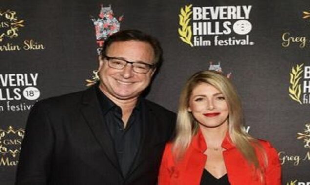 Kelly Rizzo claims she’s still in communication with Bob Saget after his death: ‘He’s still my husband,’ she says