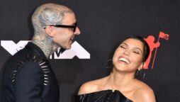 Kourtney Kardashian was photographed wearing a $1.8k bridal mini dress to a small family wedding