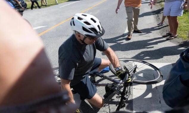 Biden falls after flubbing bike dismount