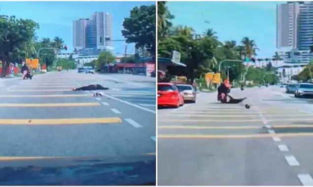 Woman riding pillion in Malaysia tumbles from bike after being struck by a coconut