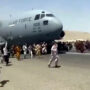 The crew of a US cargo plane that took off as Afghans died has been cleared