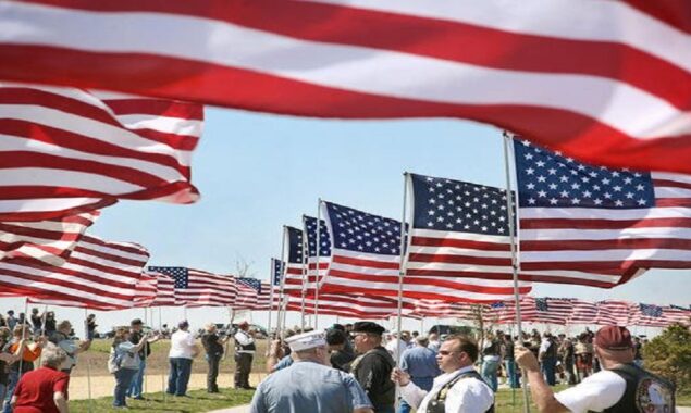Flag Day: Americans are enthusiastically raising red, blue, and white flags, high up in the sky