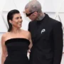 Travis Barker enjoys trip to beach with Kourtney Kardashian and her kids