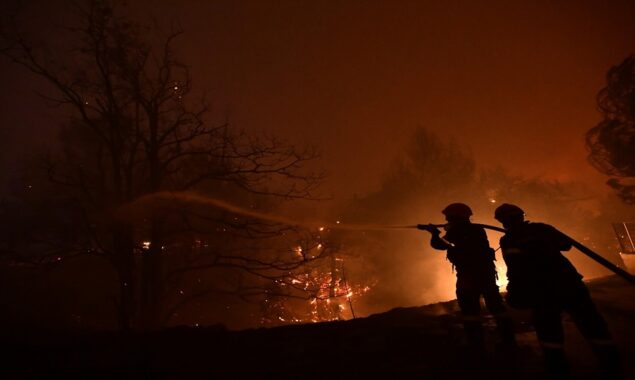 Athens residents return home as firefighters bring blaze under control