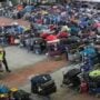 Long airport queues and luggage piles are new problems for summer travel