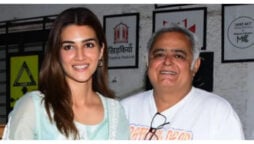 Kriti Sanon exudes charm as she poses with director Hansal Mehta