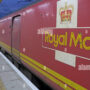 Workers at UK train operator and Royal Mail vote to go on strike