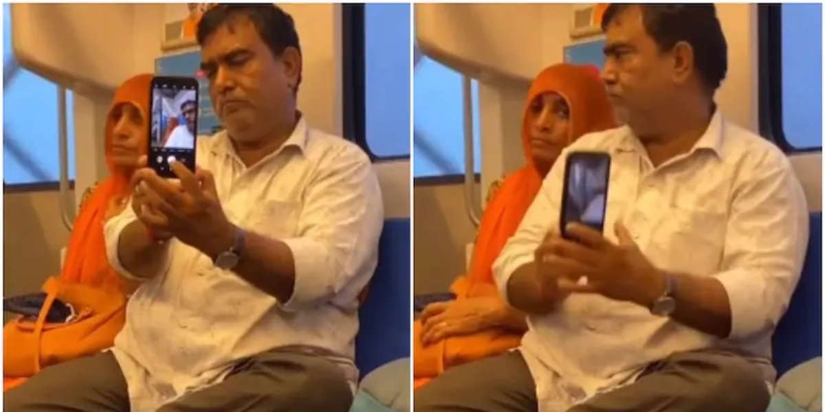 A loved-up video of a man trying to take a selfie with his wife goes viral