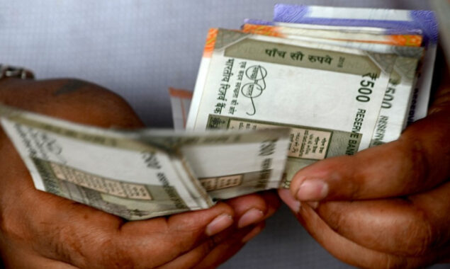Indian rupee hits record low on Fed rate hike worries