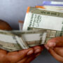 Indian rupee hits record low on Fed rate hike worries