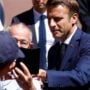 Macron faces tough battle for control of parliament as France votes