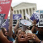 Protesters at the US Supreme Court condemn the decision to reverse Roe v. Wade on abortion