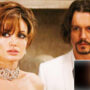  Johnny Depp and Angelina Jolie share a passionate kiss in ‘The Tourist’