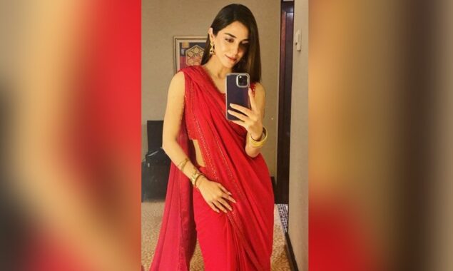 Maya Ali flaunts her curves in a red saree