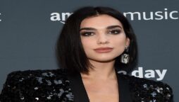 Dua Lipa’s sheer mini-dress makes a tropical fashion statement