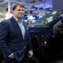 As the cost rises, Ford CEO Mark Fields predicts industry consolidation