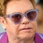 Sir Elton John answers to fans after being photographed in a wheelchair, saying, ‘I’m in great shape.’