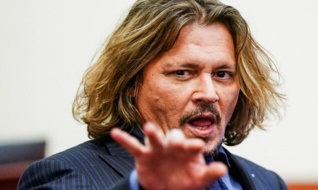 Johnny Depp gives a statement following his victory in the defamation suit against Amber Heard
