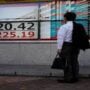 Asian shares conclude the quarter in gloom, with the dollar rising