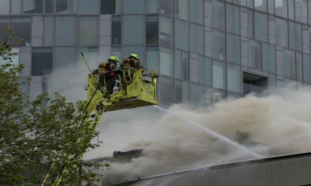 Firefighters battle a tower block fire in Bromley