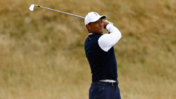 Woods makes frightfulness start at British Open