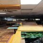 Behind a wall, a man discovers an intact vintage Burger King shop