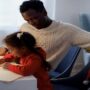 Dad learns to read and write from his daughter