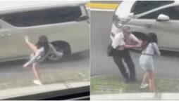 Woman is assaulted by a man for kicking his car