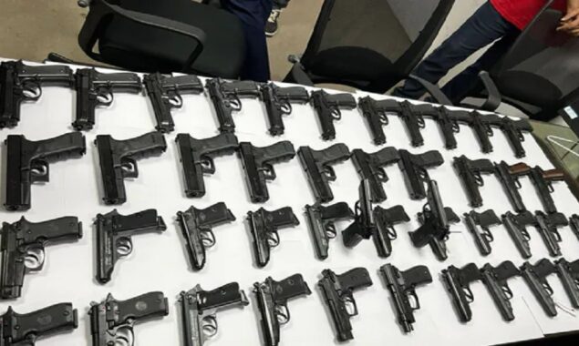 Indian couple detained at Delhi airport with 45 pistols
