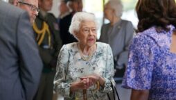 Princess Anne and Queen beat the heat to pay a surprise visit to a hospice