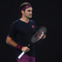 Federer indicates Wimbledon rebound on shock visit