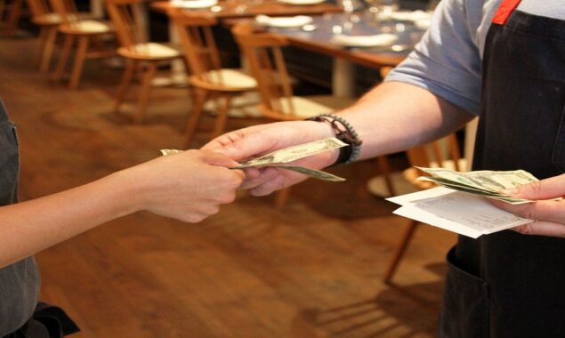 Restaurants can’t make you tip staff, the law says