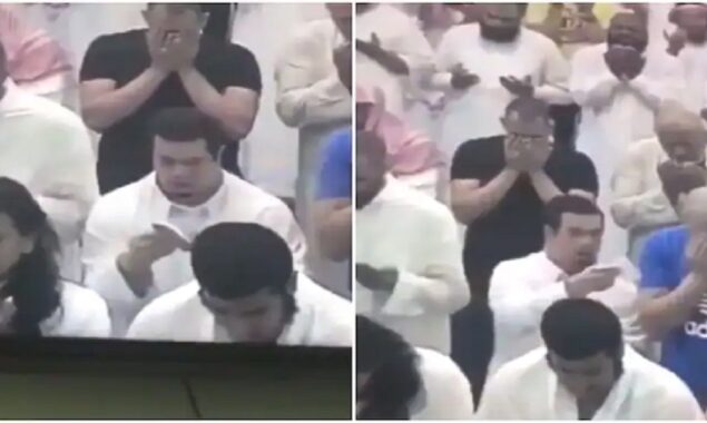 Man with Down syndrome offers tissues to a man who is sobbing during a prayer meeting