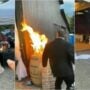 Wedding guests set decorations on fire