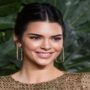 Kendall Jenner flaunts her enviable physique in a tiny yellow top