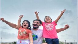 Muneeb Butt enjoys the monsoon rain with daughter