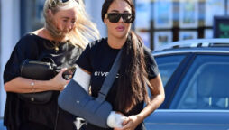 Yazmin Oukhellou pictures with arm in sling after she returns home