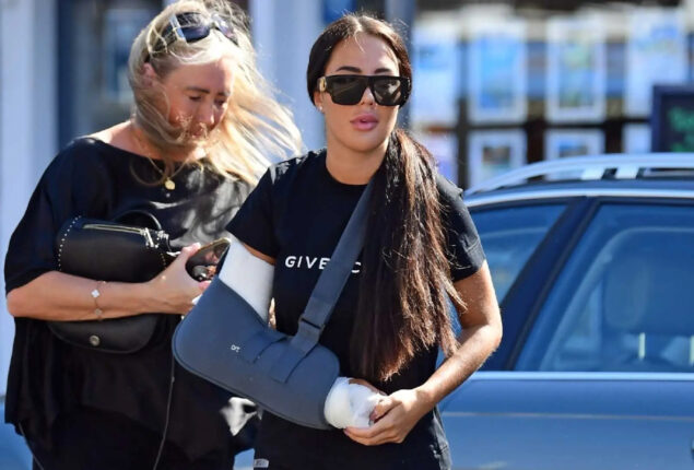 Yazmin Oukhellou pictures with arm in sling after she returns home
