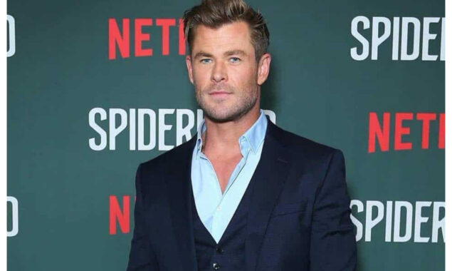 Chris Hemsworth appeared sophisticated in burgundy suit