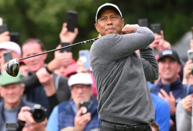 Tiger Woods plays first-round 78 at The Open in windy weather