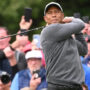 Tiger Woods plays first-round 78 at The Open in windy weather