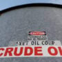 Oil prices decline after a big jump, helped by a weak dollar