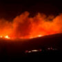 Wildfire raging near Athens damages homes and forces hospital evacuation