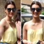Kriti Sanon gives perfect summer vibes in this pastel yellow strappy top 