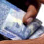 Rupee decline continues, slumps to Rs 239.94