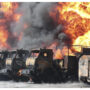 Oil depot fire rages for hours in Donetsk city held by Russian separatists