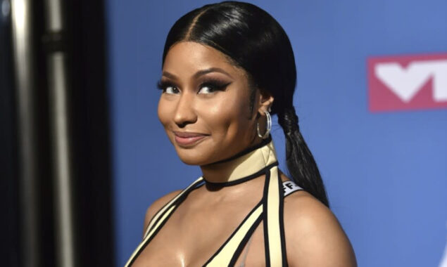 Rap star Nicki Minaj tries to mingle with her fans at a meet-and-greet