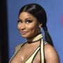 Rap star Nicki Minaj tries to mingle with her fans at a meet-and-greet